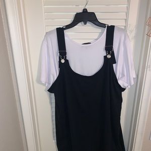 Black overall romper.